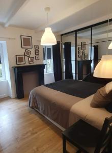 Postel nebo postele na pokoji v ubytování Hyper centre, quartier du port