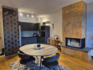 Η κουζίνα ή μικρή κουζίνα στο Apartment "Snowwood" - right next to ski slope - Garage included