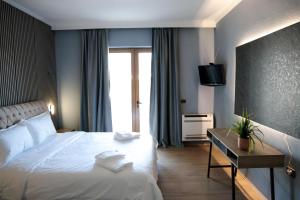 Postel nebo postele na pokoji v ubytování Balkan Crest Resort