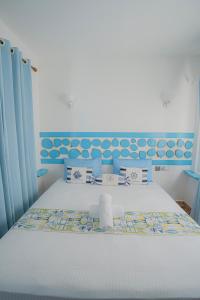 Ένα ή περισσότερα κρεβάτια σε δωμάτιο στο Alkina lodge