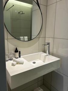 Koupelna v ubytování The Capital on the Park Sandton Living Perfected
