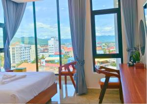 Giường trong phòng chung tại KKP Hotel +50 ảnh