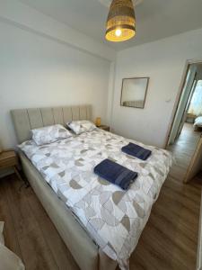 Postel nebo postele na pokoji v ubytování קסם השמיים