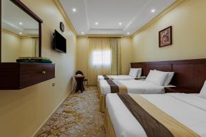 Ένα ή περισσότερα κρεβάτια σε δωμάτιο στο Verta Alshisha Hotel +28 φωτογραφίες