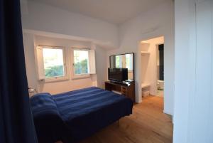 Ένα ή περισσότερα κρεβάτια σε δωμάτιο στο Suite&Breakfast La Veranda Di Fiesole