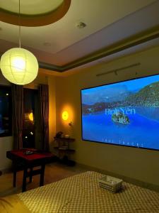Μια τηλεόραση ή/και κέντρο ψυχαγωγίας στο FIhouse appartment