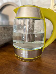 a glass jug filled with water on a table at Bambi in Pamporovo