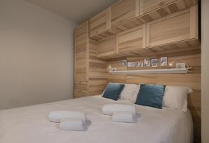 Postel nebo postele na pokoji v ubytování Aquilegia