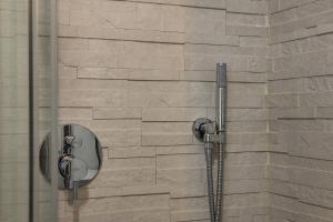 Koupelna v ubytování Aquilegia + 11 fotografií