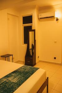 Postel nebo postele na pokoji v ubytování City Inn