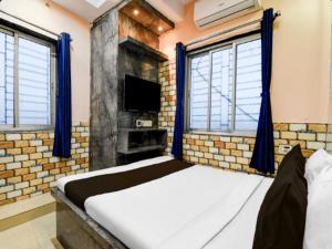 Ένα ή περισσότερα κρεβάτια σε δωμάτιο στο Hotel Sana