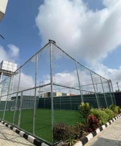 a batting cage in front of a soccer field at MM Luxury 3 bedroom Duplex Terrance in Aja