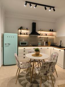 Kuchyň nebo kuchyňský kout v ubytování Simple Home