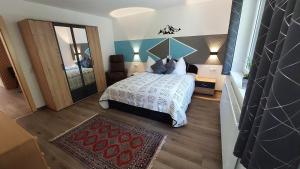 Ένα ή περισσότερα κρεβάτια σε δωμάτιο στο Haus Aloisia