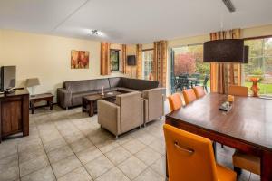 Χώρος καθιστικού στο Vennenhof Bungalow | 8 Personen