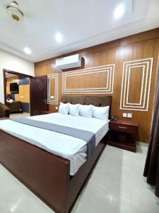 Postel nebo postele na pokoji v ubytování Hotel Luxury Express