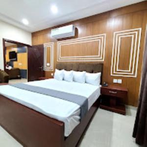 Postel nebo postele na pokoji v ubytování Hotel Luxury Express