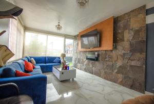 TV a/nebo společenská místnost v ubytování Amazing View Los Fuertes