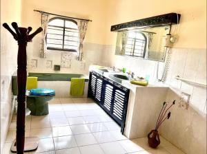 Kuchyň nebo kuchyňský kout v ubytování Paradise Garden watamu + 16 fotografií