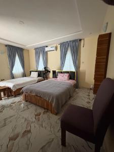 Postel nebo postele na pokoji v ubytování Bollington Adex house