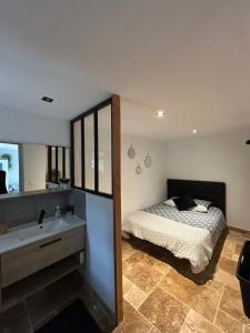 Postel nebo postele na pokoji v ubytování L Appart