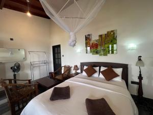 Postel nebo postele na pokoji v ubytování Blooming Rose Ella