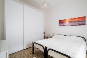 Postel nebo postele na pokoji v ubytování Casa Assunta