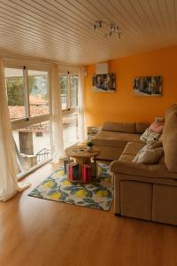 a living room with a couch and a table at Casa Diego in Melias