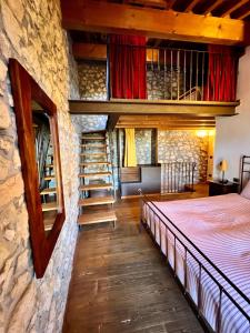 Postel nebo postele na pokoji v ubytování Corte Tamellini