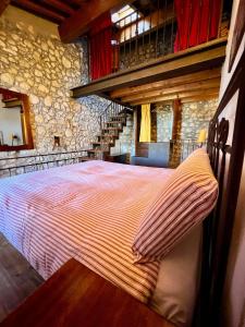 Postel nebo postele na pokoji v ubytování Corte Tamellini + 51 fotografií