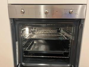 Η κουζίνα ή μικρή κουζίνα στο 2 Bedroom Apartment ANU Canberra Center