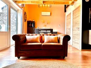 Posezení v ubytování La Hour House - Esc'Appart