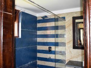 Koupelna v ubytování Amaris Greens Resort