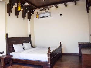 Postel nebo postele na pokoji v ubytování Amaris Greens Resort