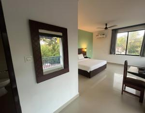 Giường trong phòng chung tại Hotel 14 Pods Morjim +23 ảnh