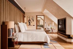 Ένα ή περισσότερα κρεβάτια σε δωμάτιο στο Rosewood Munich +106 φωτογραφίες