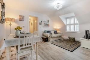 Posezení v ubytování Daisy May Apartment