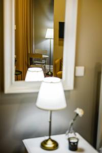 Ένα ή περισσότερα κρεβάτια σε δωμάτιο στο GuestReady - Casa Conforto & Chiado +16 φωτογραφίες