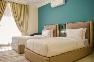 Postel nebo postele na pokoji v ubytování Zhule by Roomy, Skardu