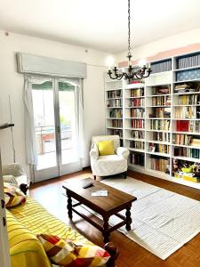 a living room with a couch and a coffee table at A casa della nonna in Imola