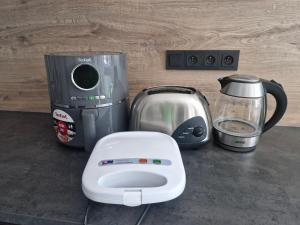 Příslušenství pro přípravu čaje a kávy v ubytování Ubytování pro rodiny s dětmi