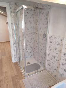 a shower with a glass door in a bathroom at Sole e Luna nella Vigna in Villanuova sul clisi +51 photos