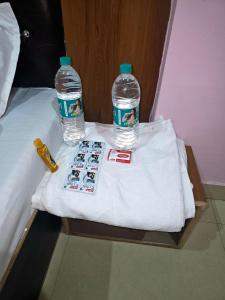 Ένα ή περισσότερα κρεβάτια σε δωμάτιο στο Hotel Gopal Place