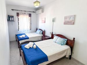 Ένα ή περισσότερα κρεβάτια σε δωμάτιο στο Residencial Boavistense by Umbral