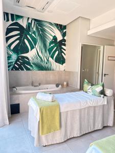 a bedroom with a bed and a bath tub at Luxury lagoon at Munyaka in Midrand +22 photos