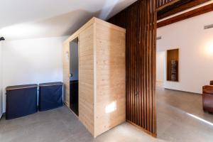 a wooden wall in the middle of a room at Mas Sureda Soccer field & indooroutdoor pools in Argelès-sur-Mer