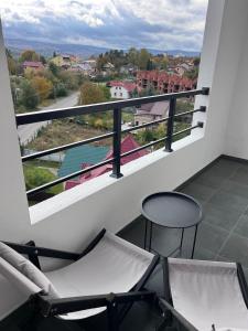 Balkón nebo terasa v ubytování Стильна нова квартира з видом на гори та вітряки