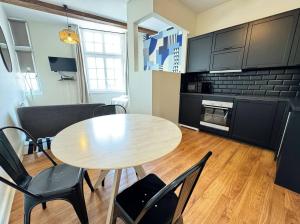 Kuchyň nebo kuchyňský kout v ubytování Best Place - Studio hyper centre ville d'Arras