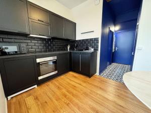 Kuchyň nebo kuchyňský kout v ubytování Best Place - Studio hyper centre ville d'Arras