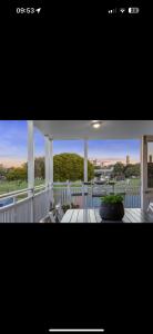 a picture of a porch with a view at Parkside Family Haven - 5bdrm in Brisbane